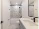 Bathroom with modern vanity, sleek fixtures, and marble tile at 2051-2053 Columbia Ave, Indianapolis, IN 46202