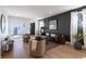 Comfortable living room with modern furniture, hardwood floors, and abundant natural light at 2051-2053 Columbia Ave, Indianapolis, IN 46202
