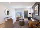 Inviting living room with stylish decor, plush seating, and access to outdoor space at 2051-2053 Columbia Ave, Indianapolis, IN 46202