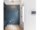Mudroom features a bench, hooks, storage, and a wood-look floor at 2051-2053 Columbia Ave, Indianapolis, IN 46202
