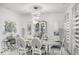 Elegant dining room featuring a modern chandelier and stylish decor at 210 Lynnette Way, Cumberland, IN 46229