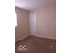 This is a basic bedroom with neutral walls, a window, and wall to wall carpet at 2250 N Goodlet Ave, Indianapolis, IN 46222