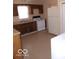 Kitchen featuring essential appliances and a functional layout at 2250 N Goodlet Ave, Indianapolis, IN 46222