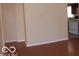 This living room features neutral walls, a window, and kitchen access at 2250 N Goodlet Ave, Indianapolis, IN 46222