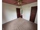 Spacious bedroom with carpet floors and a closet, offering ample storage at 2411 Harlan St, Indianapolis, IN 46203