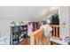 Finished attic space featuring wood floors, storage options, and a closet for storage at 3018 S Anthony Blvd, Fort Wayne, IN 46806
