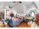 Spacious attic featuring wood floors, natural light, and a versatile layout at 3018 S Anthony Blvd, Fort Wayne, IN 46806