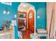 Entryway showcasing a wooden door, built-in storage, and hardwood flooring at 3018 S Anthony Blvd, Fort Wayne, IN 46806