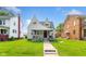 Inviting home with a classic facade, covered porch, and lush green lawn at 3018 S Anthony Blvd, Fort Wayne, IN 46806