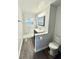 Stylish bathroom with modern fixtures and marble tiled shower at 3103 Keswick Rd, Indianapolis, IN 46222