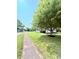 Charming home with a well-maintained lawn and a mature shade tree in the front yard at 3103 Keswick Rd, Indianapolis, IN 46222