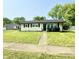 Charming single-story home featuring well-maintained lawn and classic curb appeal at 3103 Keswick Rd, Indianapolis, IN 46222