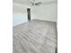 Bright and spacious living room with modern flooring at 3103 Keswick Rd, Indianapolis, IN 46222