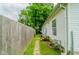 The backyard has a walking path, privacy fence and green space at 3149 Carson Ave, Indianapolis, IN 46227