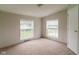 This is a bedroom featuring neutral walls, two windows and carpeted floors at 3149 Carson Ave, Indianapolis, IN 46227