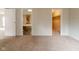 View from a bedroom with doorways that lead to a bathroom with a large tub and a walk-in closet at 3149 Carson Ave, Indianapolis, IN 46227