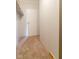 This is a walk-in closet with a hanging rod and additional storage area to the right at 3149 Carson Ave, Indianapolis, IN 46227