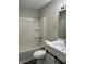 Clean bathroom with a shower-tub combo, white vanity, and a modern mirror, offering a functional space at 3259 Pawnee Dr, Indianapolis, IN 46235