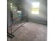 This bedroom features neutral gray walls and lots of sunlight at 3570 Decamp Dr, Indianapolis, IN 46226