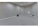 Finished basement provides flexible space for recreation or relaxation with carpeted floors and neutral paint at 3795 Claybrook Ct, Bargersville, IN 46106