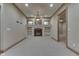 Finished basement living room with fireplace and built-in shelving at 3795 Claybrook Ct, Bargersville, IN 46106