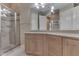 Bathroom featuring a walk-in shower, large mirror, and a wooden vanity with ample storage at 3795 Claybrook Ct, Bargersville, IN 46106