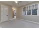 Cozy bedroom featuring a ceiling fan, closet, and large window for bright natural lighting at 3795 Claybrook Ct, Bargersville, IN 46106