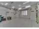 Spacious three car garage with storage and shelving at 3795 Claybrook Ct, Bargersville, IN 46106