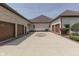Attached three-car garage of home offers ample parking space and convenience with lush landscaping at 3795 Claybrook Ct, Bargersville, IN 46106