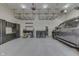 Epoxy floor garage with built-in storage, overhead racks, workspace and parking for vehicles at 3795 Claybrook Ct, Bargersville, IN 46106