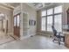 Office with custom built-ins, large window with plantation shutters, and beautiful flooring at 3795 Claybrook Ct, Bargersville, IN 46106