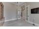 Open office space with large windows, French doors, and lots of space to do your work from home at 3795 Claybrook Ct, Bargersville, IN 46106