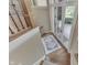 Elegant staircase with hardwood steps, decorative carpet, and natural light at 3795 Claybrook Ct, Bargersville, IN 46106