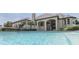 A refreshing swimming pool offers cool respite on a hot day with the home visible in the background at 3795 Claybrook Ct, Bargersville, IN 46106