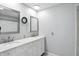 Bathroom featuring double sinks with white marble countertops and brushed silver fixtures at 3905 E 550 S, Lebanon, IN 46052