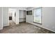 Bedroom featuring gray walls, plush carpet, a window and a work space at 3905 E 550 S, Lebanon, IN 46052