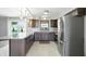 Modern kitchen with stainless steel appliances, granite countertops, tile backsplash, and access to the pool at 3905 E 550 S, Lebanon, IN 46052