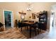 Dining room featuring modern flooring, neutral walls and a view to the kitchen at 4233 Pearson Dr, Westfield, IN 46062