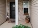 Cozy entryway with decorative accents, a 'Grandma & Grandpa's House' sign, and a charming welcome mat at 4233 Pearson Dr, Westfield, IN 46062