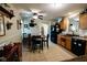Spacious kitchen featuring a dining table, ample cabinet space, and black appliances at 4233 Pearson Dr, Westfield, IN 46062