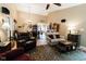 Inviting living room featuring neutral walls, ceiling fan, and comfortable seating arrangement at 4233 Pearson Dr, Westfield, IN 46062