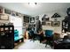 Office space featuring multiple desks, patriotic decor, and natural light from a window at 4233 Pearson Dr, Westfield, IN 46062