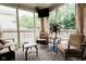 Relaxing screened porch offering outdoor seating and a view of the backyard at 4233 Pearson Dr, Westfield, IN 46062