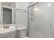 Bathroom with sink, toilet and glass shower door at 4350 Sylvan Rd, Indianapolis, IN 46228