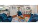 Open-concept living area with hardwood floors and view to the entryway at 4350 Sylvan Rd, Indianapolis, IN 46228