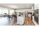 Open kitchen featuring stainless steel appliances, an island, and a breakfast nook at 4358 Persian St, Greenwood, IN 46143