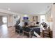 Open concept living room with fireplace, modern furniture, and plenty of natural light at 4358 Persian St, Greenwood, IN 46143