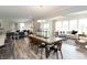 Bright and airy living room with a large table, fireplace and neutral decor at 4358 Persian St, Greenwood, IN 46143