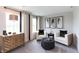 This contemporary sitting area features stylish decor, neutral colors, and abundant natural light at 4358 Persian St, Greenwood, IN 46143