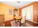 The dining room features hardwood floors, natural light, and neutral colors at 4420 Victory Blvd, Indianapolis, IN 46203